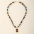Beaded Necklace With Framed Oval Cabochon: Brown